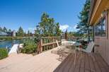 Enjoy breathtaking lake views from this stunning property! This home features a spacious deck perfect for entertaining or relaxing.