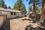 Discover the charm of this inviting property, featuring a cozy exterior and a well-maintained yard.