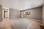 Step into this inviting living space, featuring a neutral color palette and ample natural light.