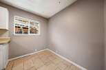 This inviting space features a bright window that allows natural light to flood the room.