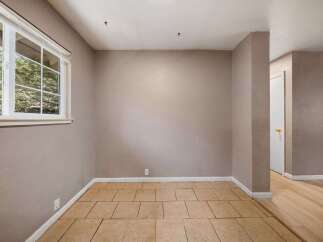 Discover the potential of this inviting space! This room features a neutral color palette, perfect for any design vision.