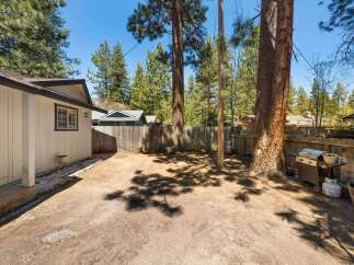 Discover the potential of this charming property! This backyard features a spacious area, perfect for outdoor gatherings and relaxation.