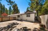 This charming property boasts a cozy exterior with a welcoming entrance.