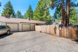 Discover this charming property featuring a two-car garage and a welcoming driveway.