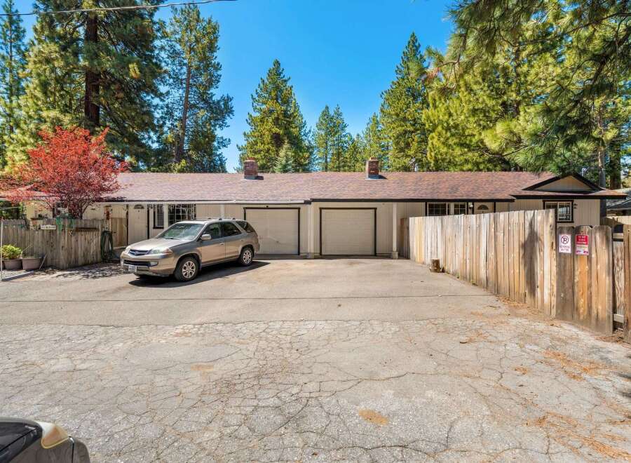 Discover the charm of this inviting property, featuring a well-maintained exterior and a convenient driveway.