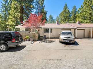 Charming home nestled in a serene location, offering a blend of comfort and natural beauty.