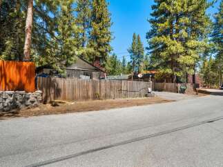 Discover a charming property nestled in a serene, tree-lined neighborhood.