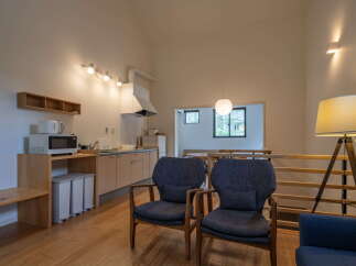 Discover the charm of this inviting property, featuring a well-equipped kitchen and a cozy living area.