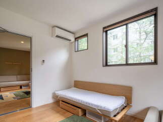 Discover a cozy and inviting bedroom space, perfect for relaxation.