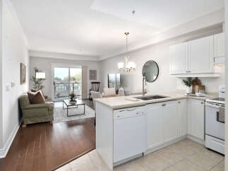 This stunning condo boasts a bright and airy open-concept living space, perfect for entertaining.