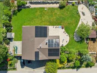 Discover this stunning property featuring a modern home with solar panels, offering energy efficiency and a sustainable lifestyle.