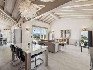 Experience luxury living in this stunning property, featuring a bright and airy open-plan design.