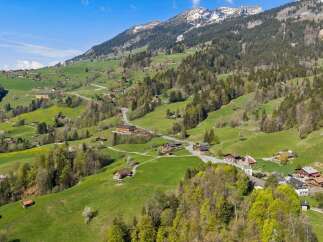 Nestled in a picturesque mountain landscape, this property offers stunning views and a tranquil setting.