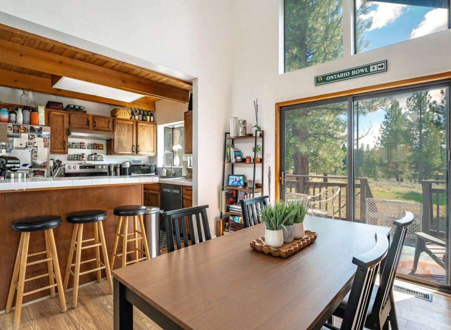 Step into this inviting dining area, perfect for both everyday meals and entertaining.