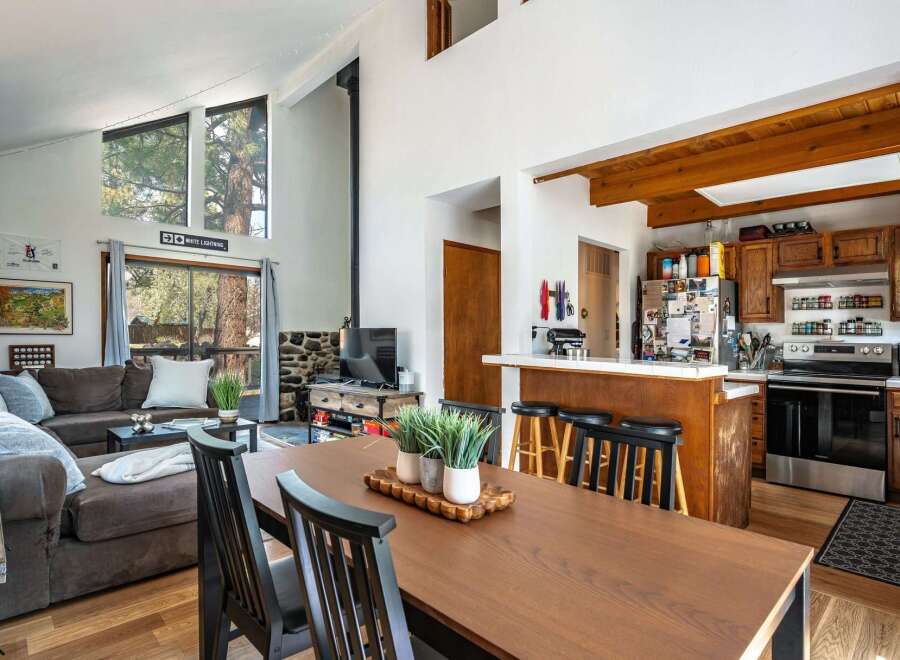 This stunning property boasts a spacious open-concept living area, perfect for entertaining.