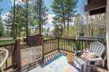 Enjoy the tranquility of this charming property with a beautiful deck overlooking a lush landscape.