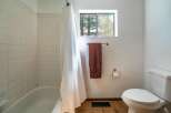 This charming bathroom features a classic design with a clean and inviting atmosphere.