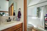This charming bathroom features a classic design with a touch of warmth.