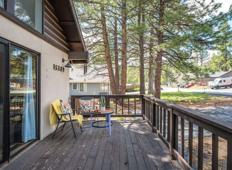 Enjoy the tranquility of this charming property with a welcoming front porch.