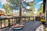 Enjoy the tranquility of this charming property featuring a spacious deck perfect for relaxation and outdoor gatherings.
