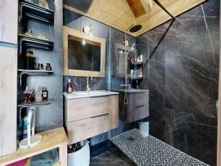 Step into luxury with this stunning bathroom, featuring a sleek design and high-end finishes.