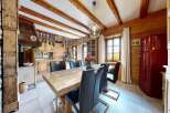 Step into rustic elegance with this stunning dining room.