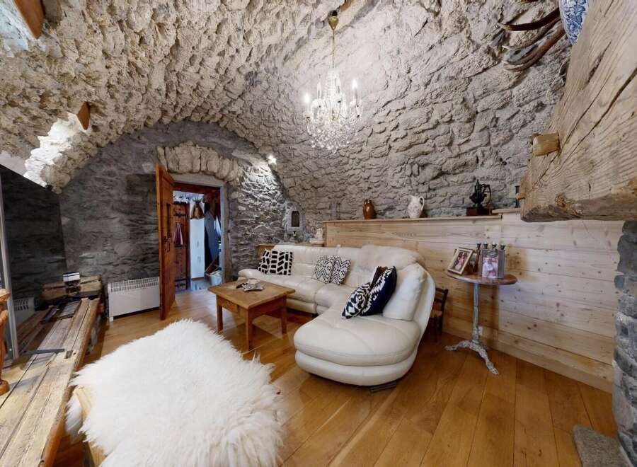Step into rustic elegance with this stunning property! Featuring a unique stone wall interior and a cozy, inviting atmosphere, this home offers a blend of charm and modern comfort.
