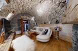 Step into rustic elegance with this stunning property! Featuring a unique stone wall interior and a cozy, inviting atmosphere, this home offers a blend of charm and modern comfort.