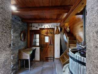 Step into rustic charm with this unique property, showcasing a blend of traditional design and modern comfort.