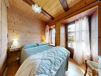 Step into a cozy bedroom retreat with rustic charm.