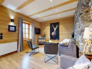 Step into a cozy and inviting living space, perfect for relaxation and entertainment.
