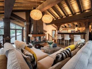 Experience luxury living in this stunning property featuring a cozy fireplace, perfect for chilly evenings.