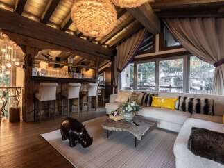 Experience luxury living in this stunning property, featuring a beautifully designed bar area perfect for entertaining.