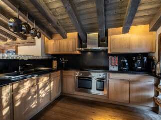 Experience the epitome of rustic elegance in this stunning kitchen.