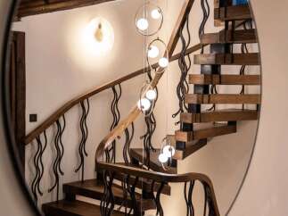 This stunning property boasts a beautifully crafted staircase, a focal point of the home's interior design.