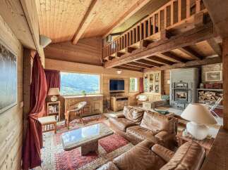 Experience the warmth of this stunning wooden chalet, perfect for a cozy retreat.