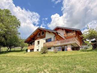 Discover your dream home nestled in a serene landscape.