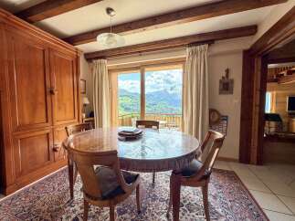 Experience the tranquility of mountain living in this charming property.