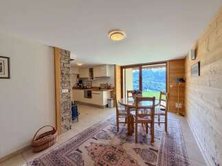 Discover the charm of this inviting property, featuring a bright and airy dining area with stunning mountain views.
