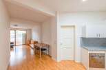Discover this inviting property featuring a well-lit living space with beautiful hardwood floors.