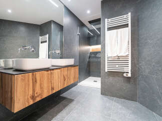Step into a modern oasis with this stunning bathroom design.
