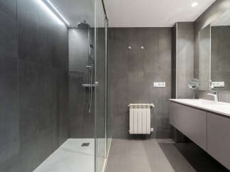 Step into a modern oasis with this sleek bathroom design.