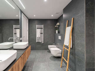 Step into a modern bathroom oasis, featuring sleek design and luxurious finishes.