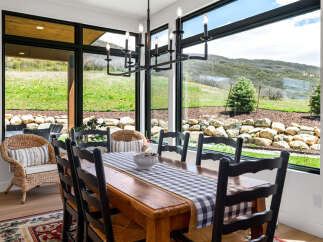 Experience the perfect blend of indoor and outdoor living in this stunning dining room.