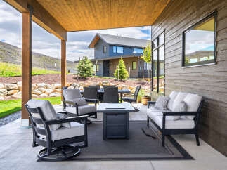 Enjoy luxurious outdoor living in this stunning property, featuring a beautifully designed patio.