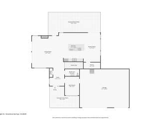 Discover this spacious Steamboat Springs home featuring a large living room with a fireplace, perfect for cozy evenings.