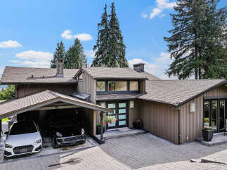 This stunning property boasts a modern design with a beautiful exterior.