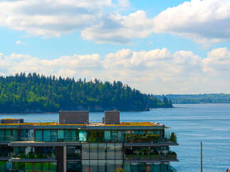 Experience luxury living with stunning waterfront views from this modern property.