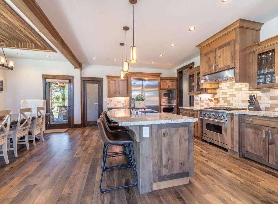 This stunning kitchen boasts a spacious island with seating, perfect for entertaining.