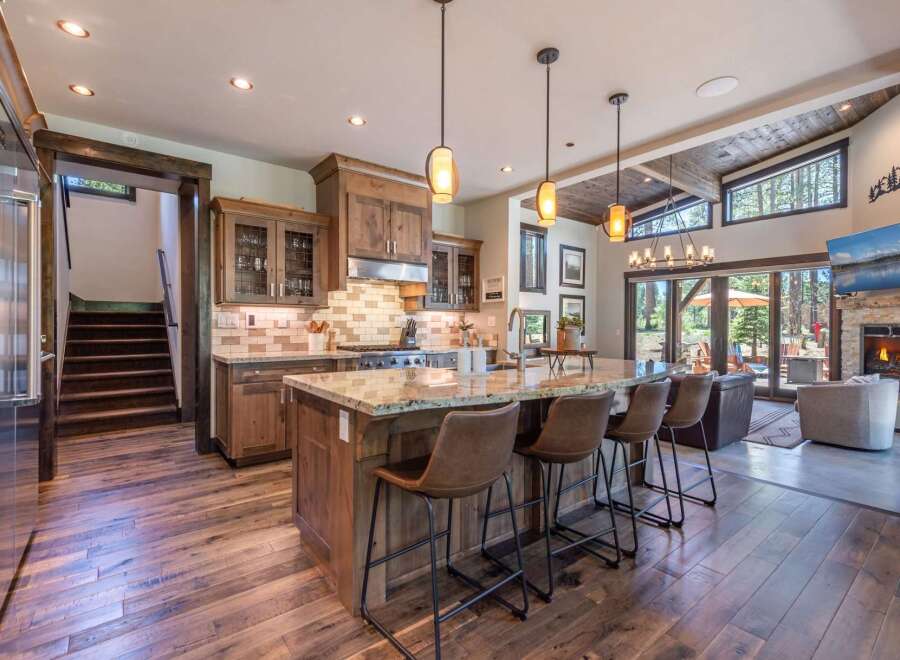 This stunning kitchen boasts a spacious island with seating, perfect for entertaining.